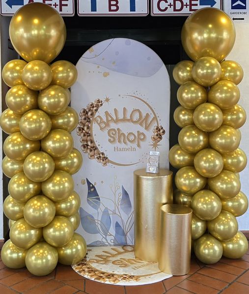 Ballonsäulen in Gold mit Ballon-Shop-Backdrop · Hochzeitsmesse Hameln 2026